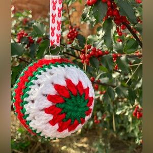 Crocheted Granny Stitch Christmas Ornament with Breast cancer symbol ribbon